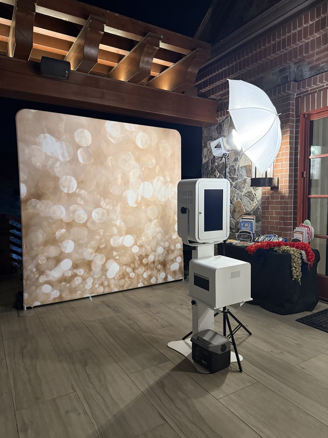Photo booth and backdrop set up for an event